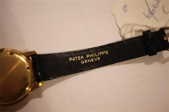 A gentlemans 1950s 18ct gold Patek Philippe Calatrava manual wind wristwatch,